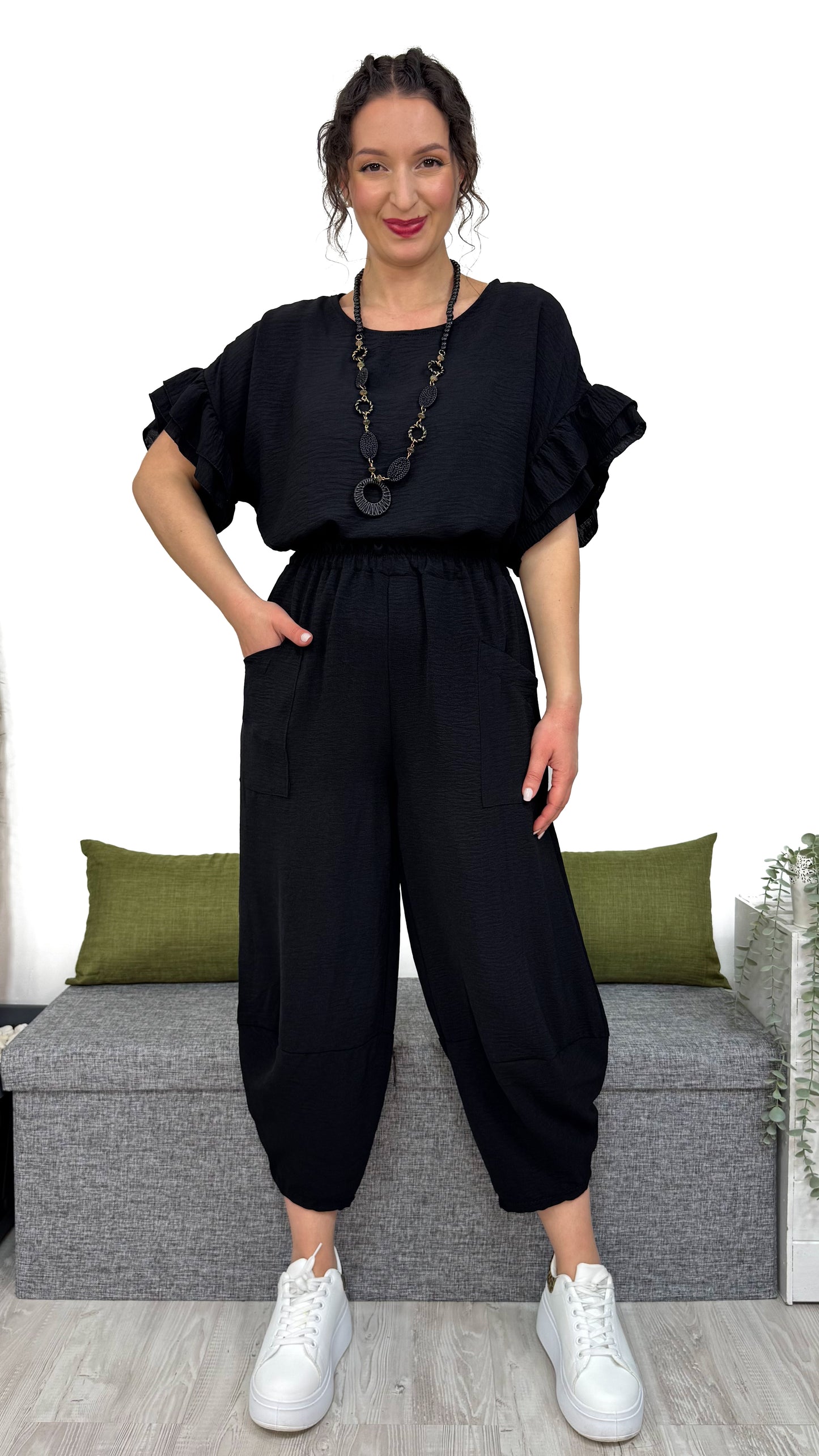 PANTALONE MAMBO con taglio obliquo sulla caviglia