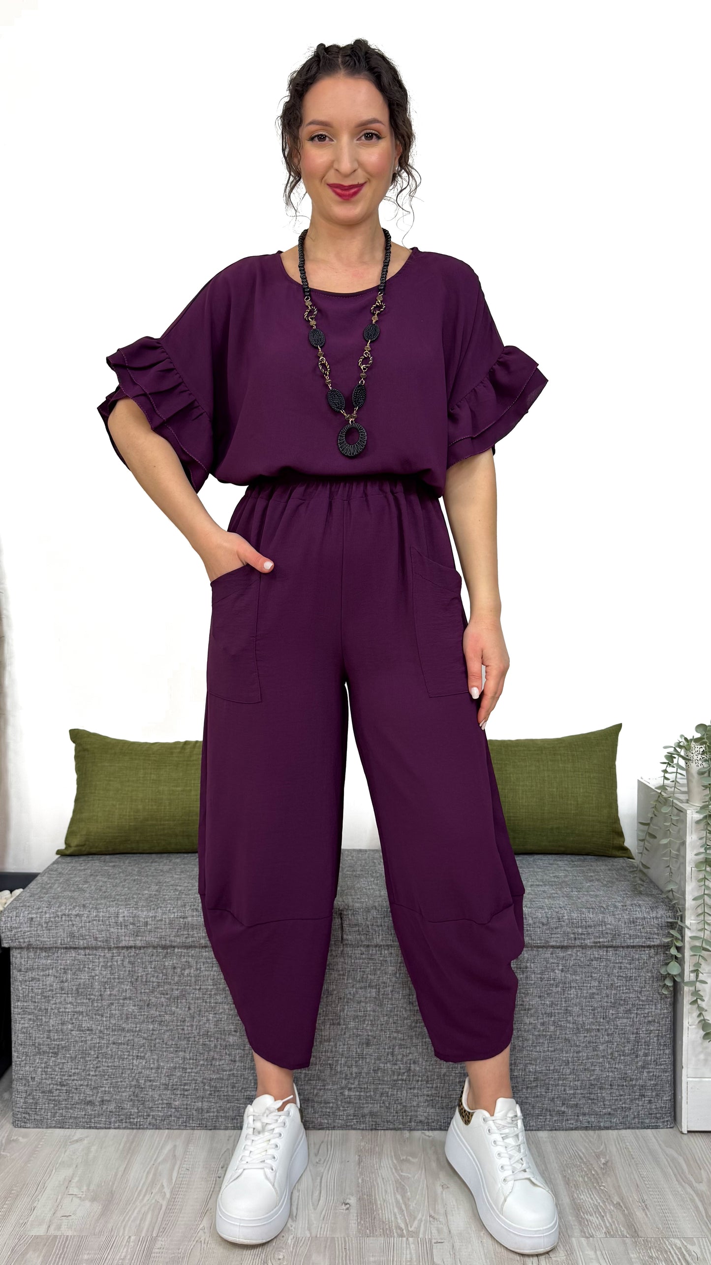 PANTALONE MAMBO con taglio obliquo sulla caviglia