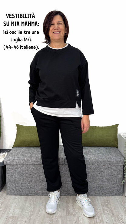 TUTA FELPATA CON BORDINO