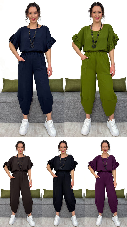 PANTALONE MAMBO con taglio obliquo sulla caviglia