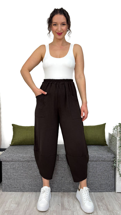 PANTALONE MAMBO con taglio obliquo sulla caviglia