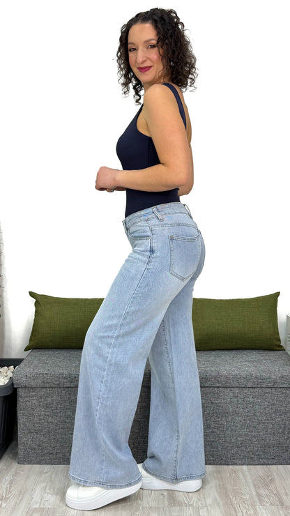JEANS A ZAMPA CON VITA BASSA
