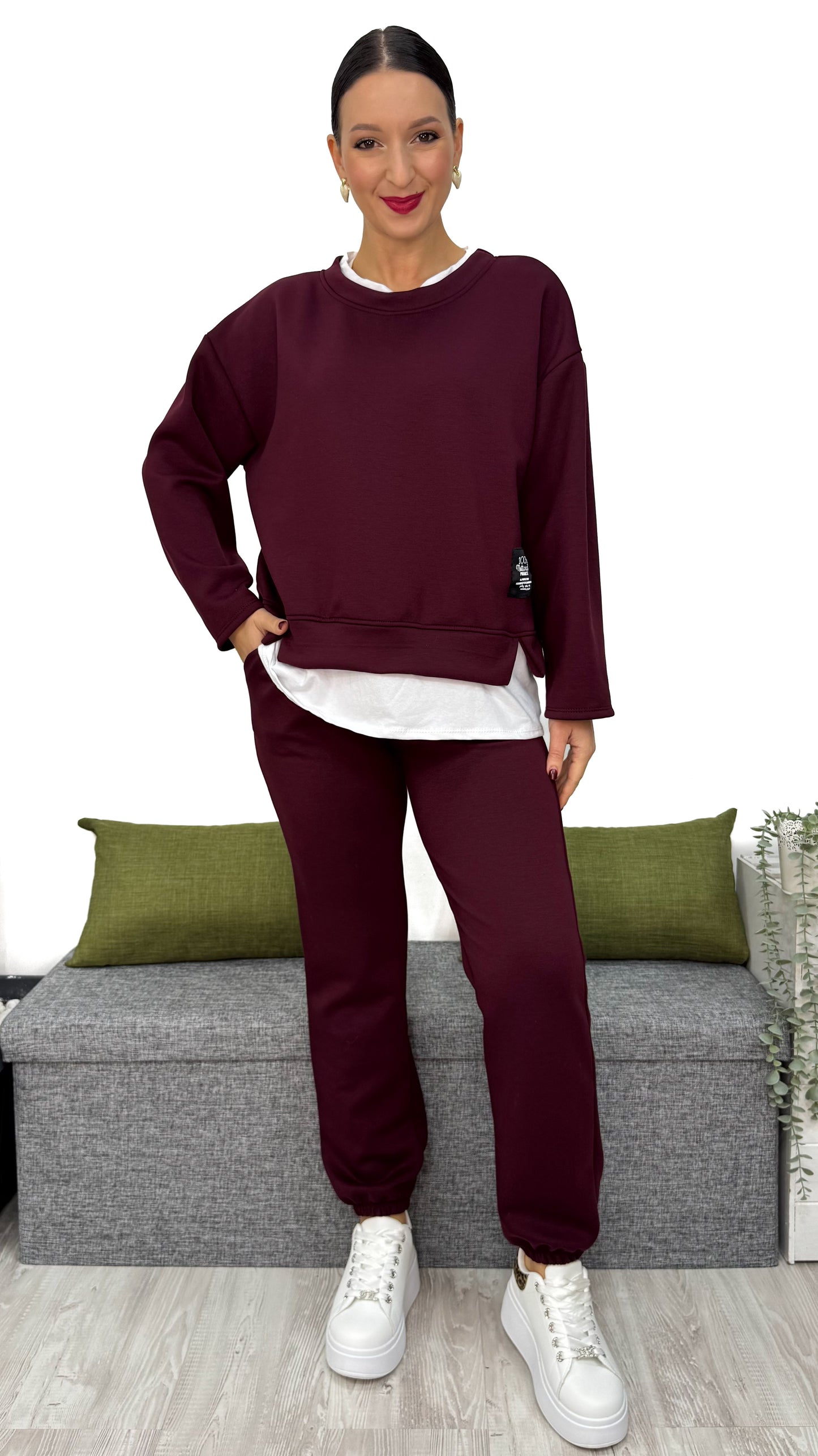 TUTA FELPATA CON BORDINO